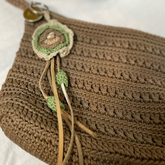 The Sak Crochet Shoulder Bag in Cognac color. Crochet Flower detail on zipper. - Picture 4 of 10